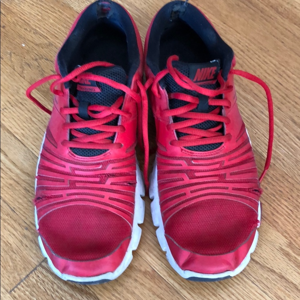 Red Nike running shoes